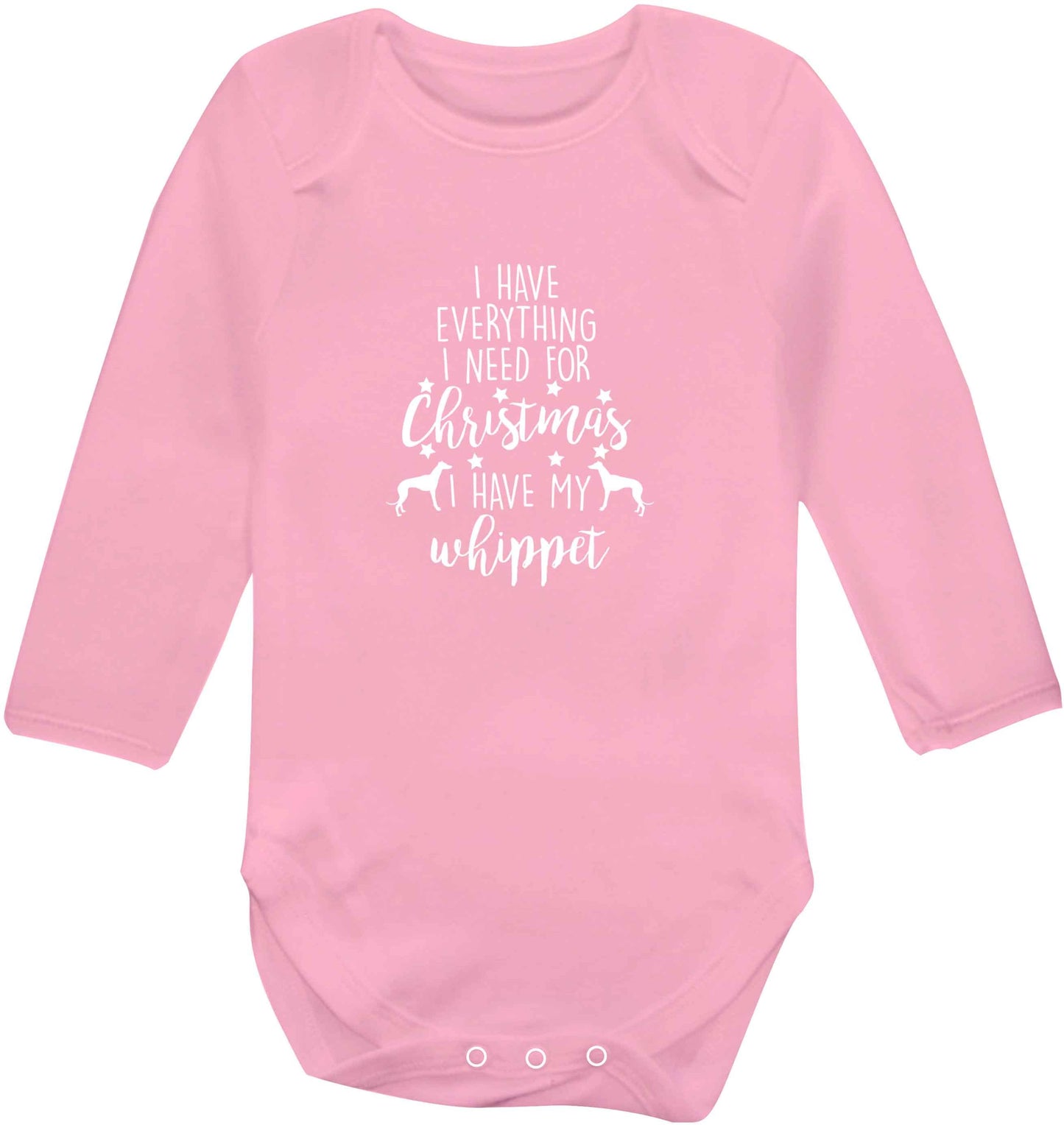 I have everything I need for Christmas I have my whippet baby vest long sleeved pale pink 6-12 months