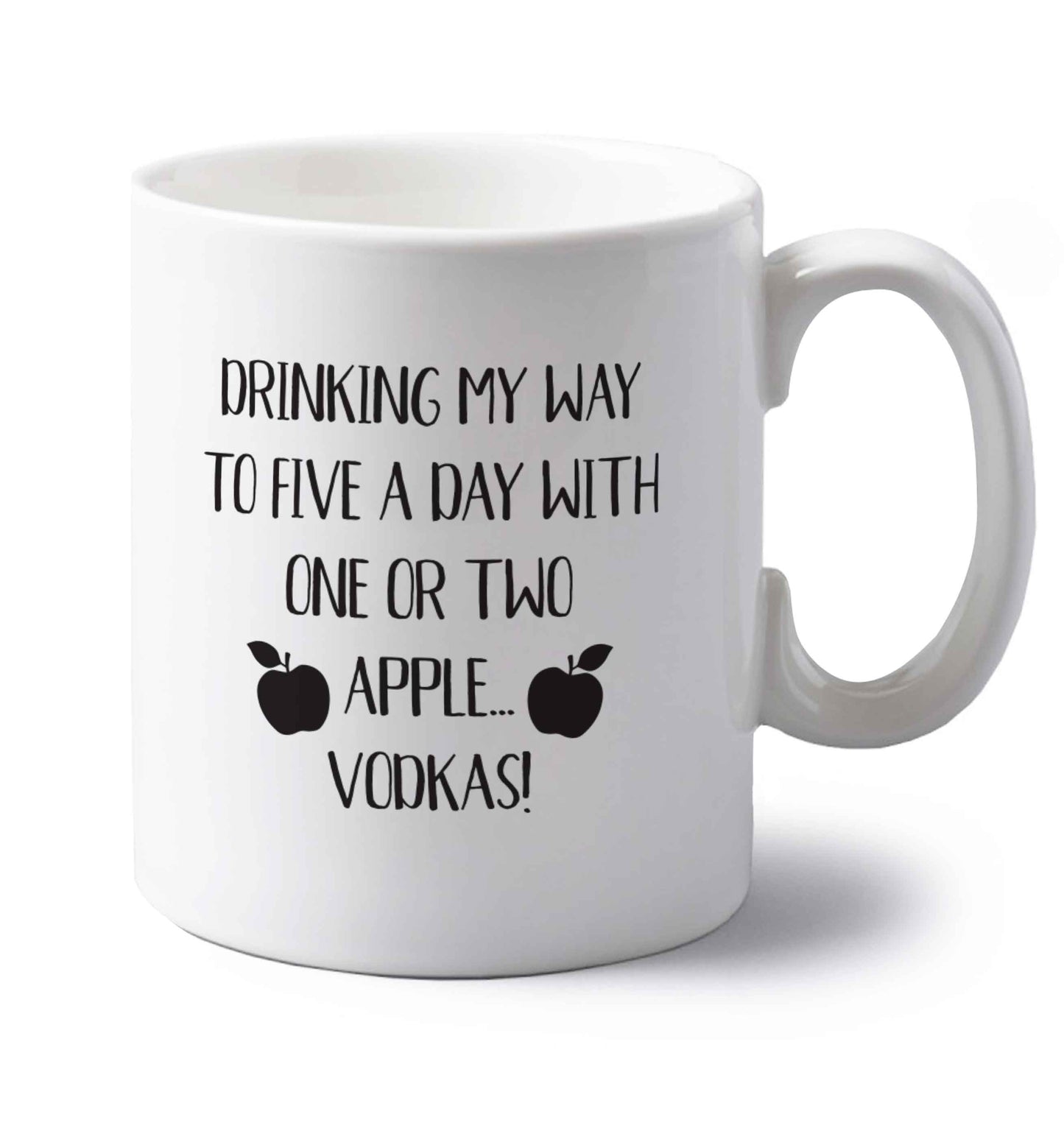 Drinking my way to five a day with one or two apple vodkas left handed white ceramic mug