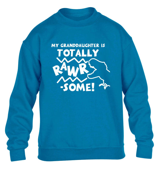My granddaughter is totally rawrsome children's blue sweater 12-13 Years