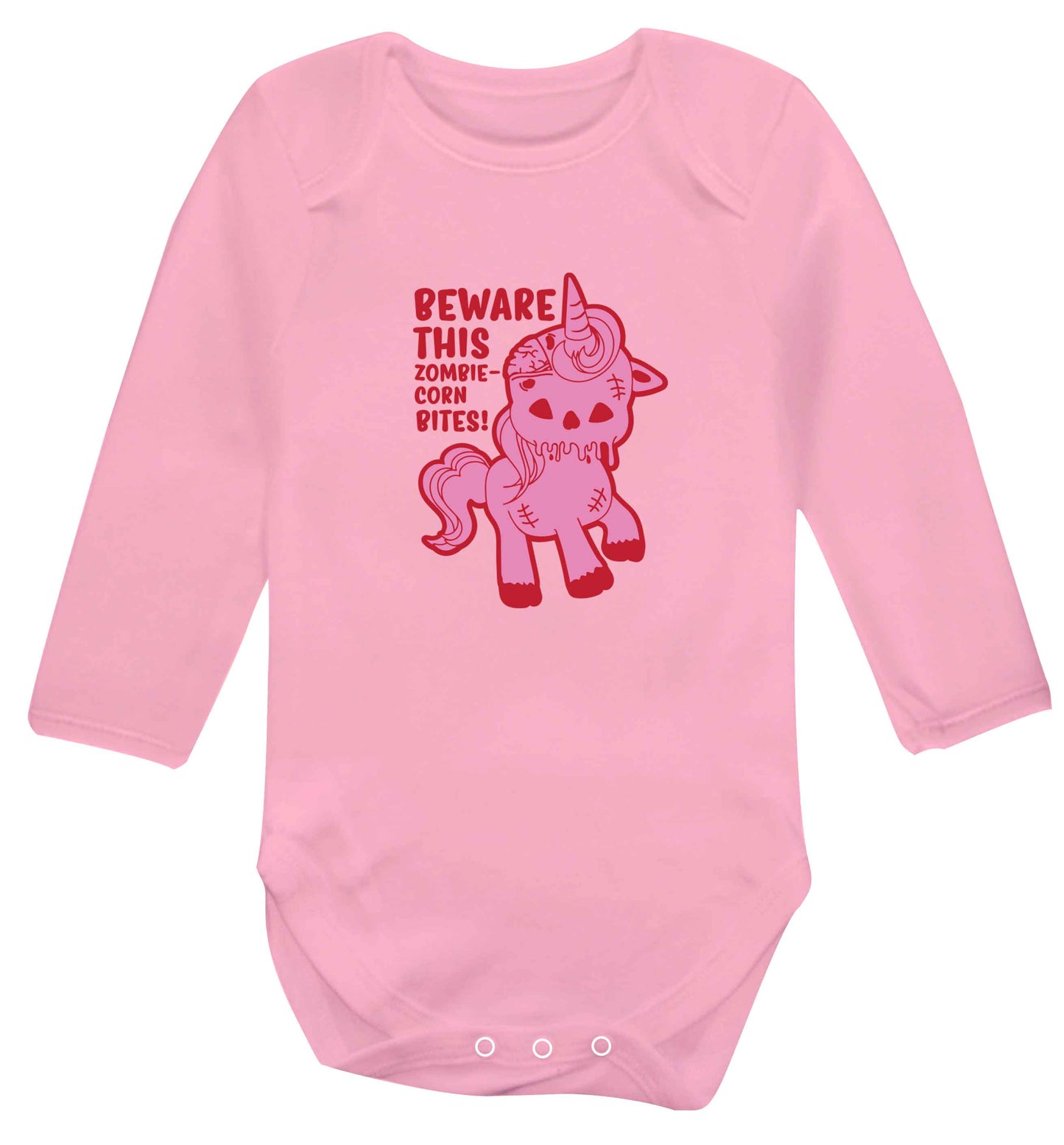 Beware this zombiecorn bites baby vest long sleeved pale pink 6-12 months