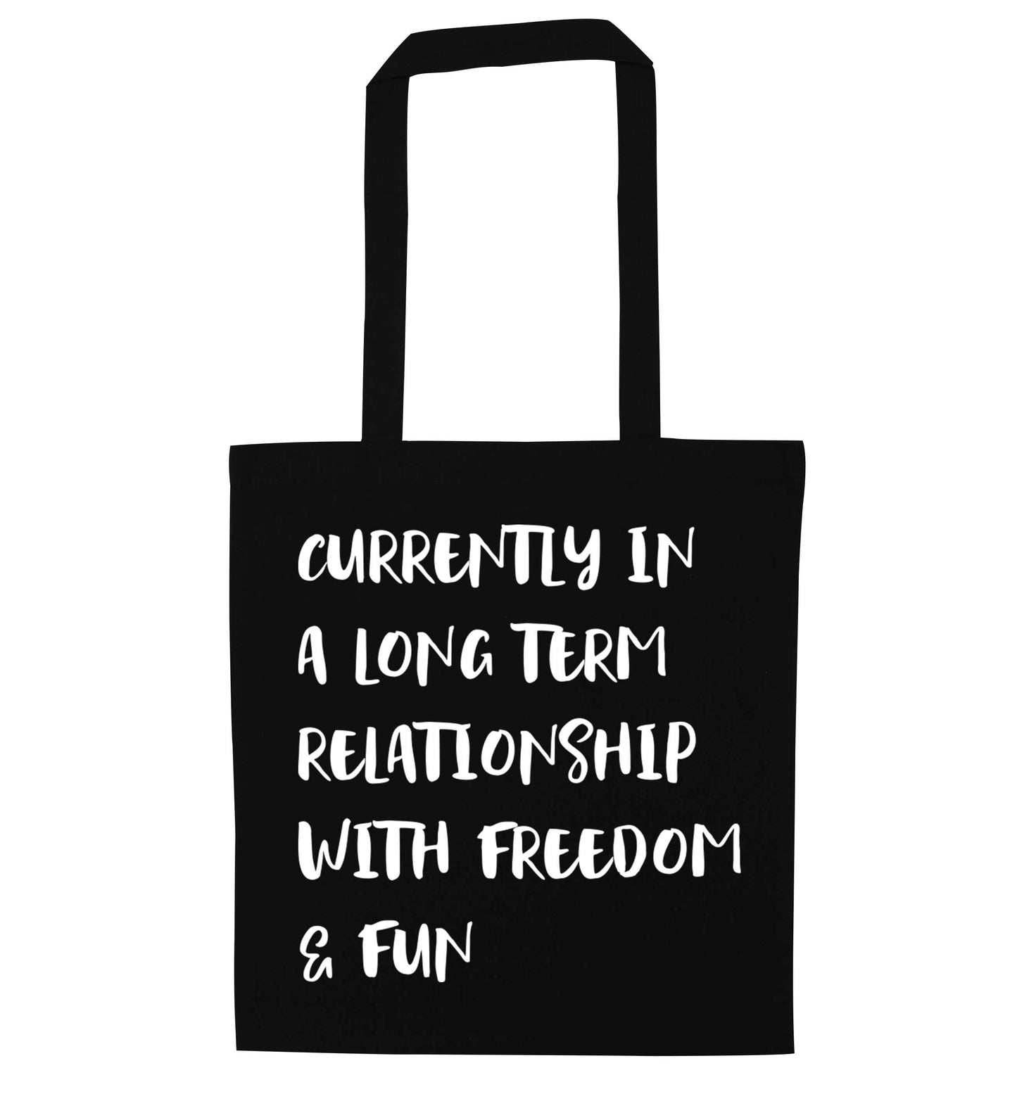 Currently in a long term relationship with freedom and fun black tote bag