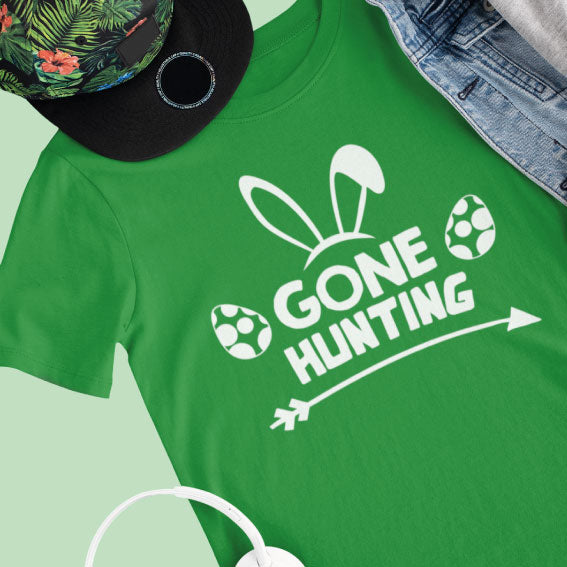 Gone hunting with bunny ears above and easter eggs either side kids green Easter T-Shirt