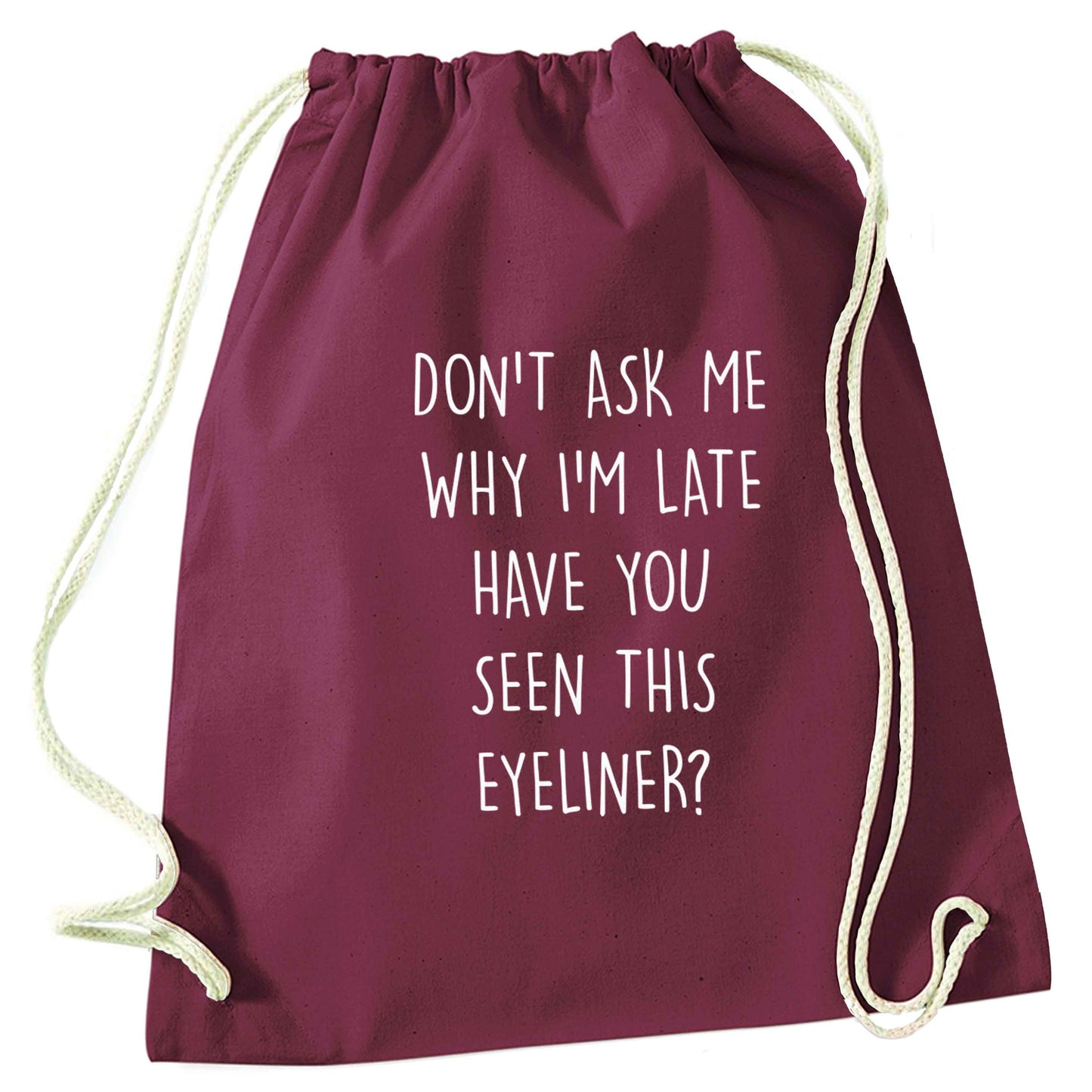Don't ask why I'm late have you seen this eyeliner?! maroon drawstring bag