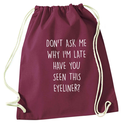 Don't ask why I'm late have you seen this eyeliner?! maroon drawstring bag