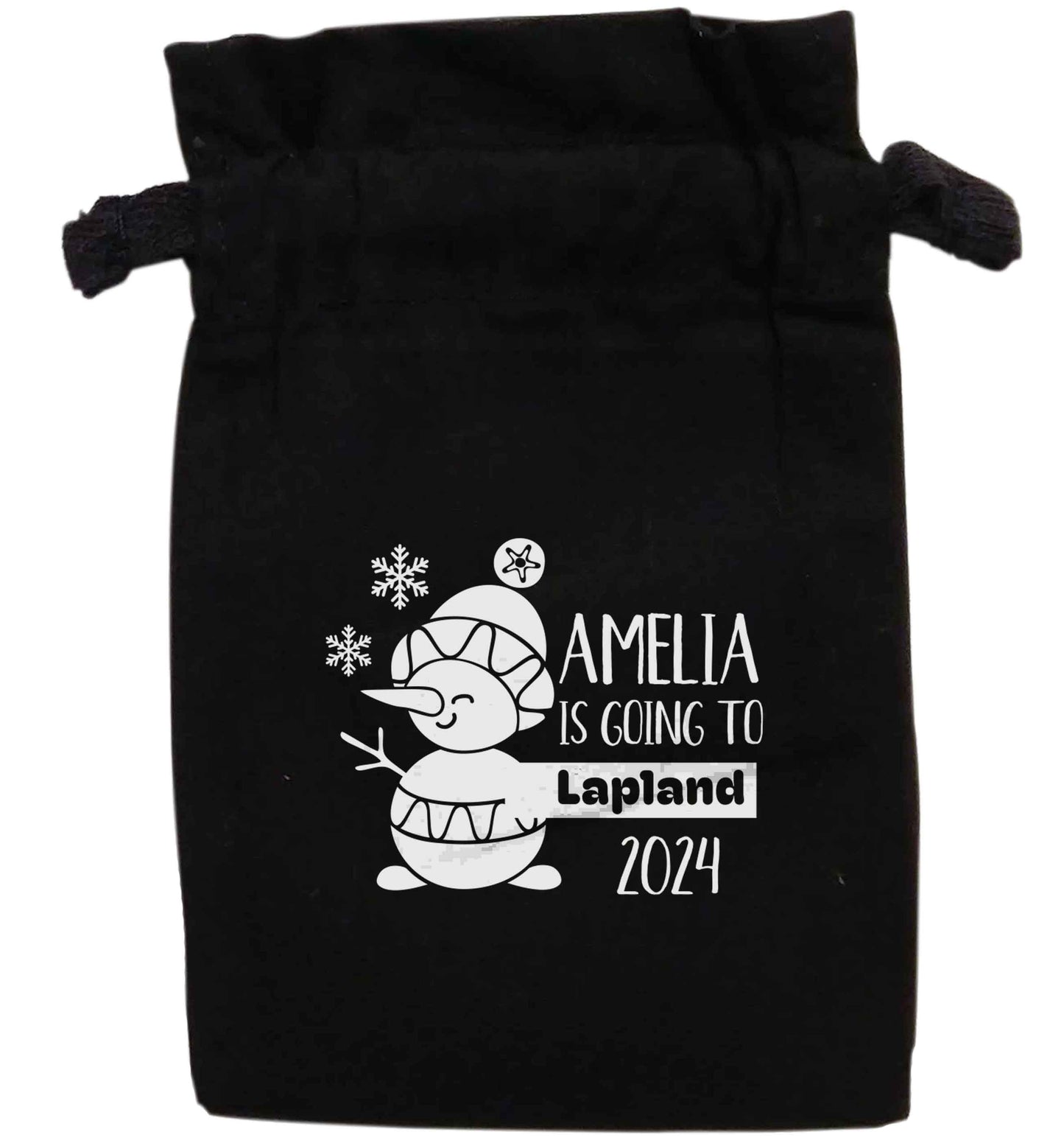 Any name here - is going to Lapland personalised | XS - L | Pouch / Drawstring bag / Sack | Organic Cotton | Bulk discounts available!