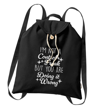 I'm not a control freak but you are doing it wrong organic cotton backpack tote with wooden buttons in black
