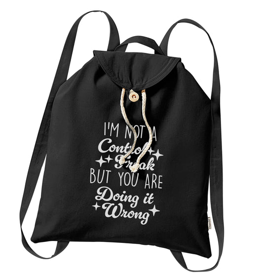 I'm not a control freak but you are doing it wrong organic cotton backpack tote with wooden buttons in black