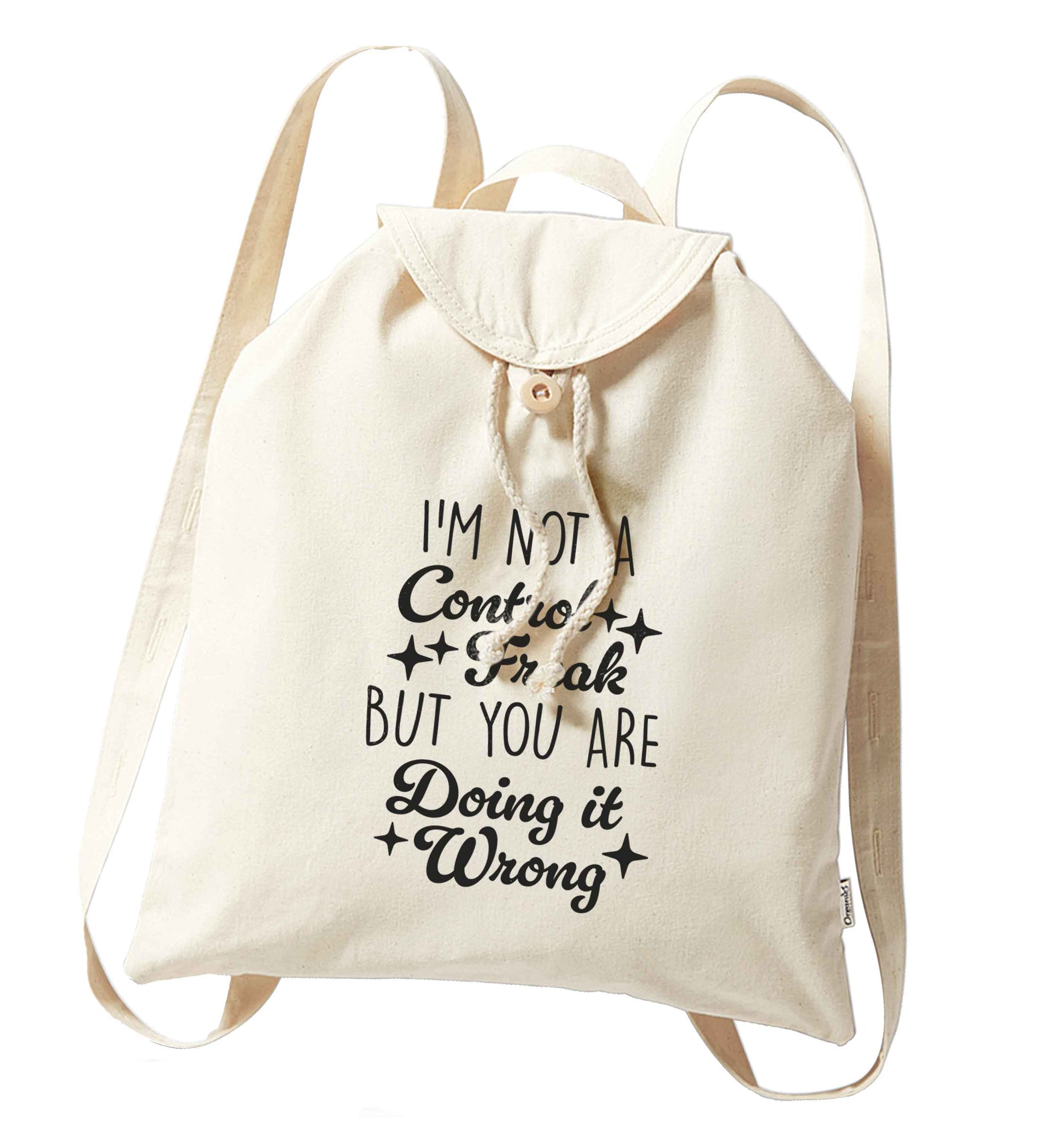 I'm not a control freak but you are doing it wrong organic cotton backpack tote with wooden buttons in natural