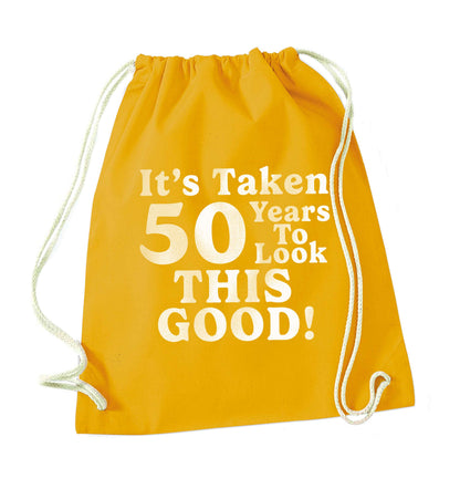 It's taken 50 years to look this good! mustard drawstring bag