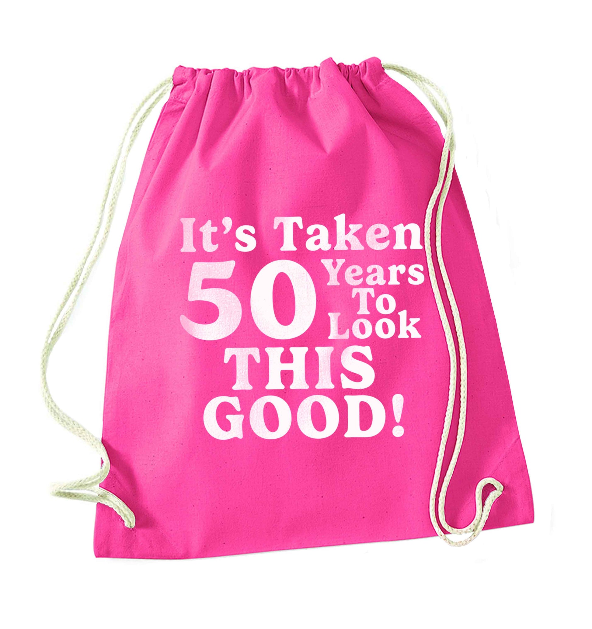 It's taken 50 years to look this good! pink drawstring bag