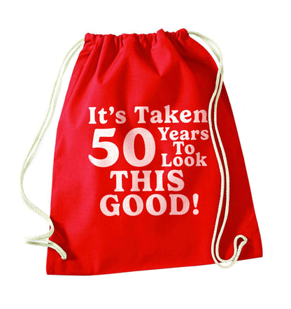 It's taken 50 years to look this good! red drawstring bag