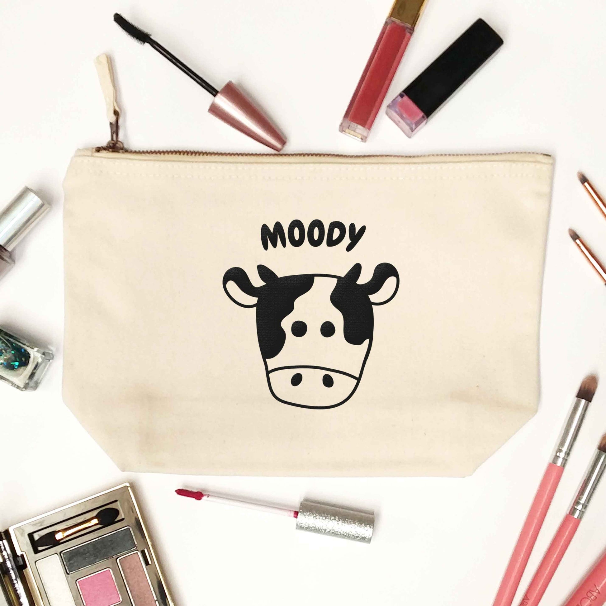 Moody cow illustration natural makeup bag