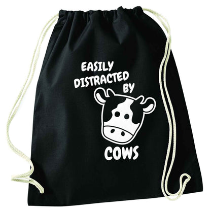 Easily distracted by cows black drawstring bag