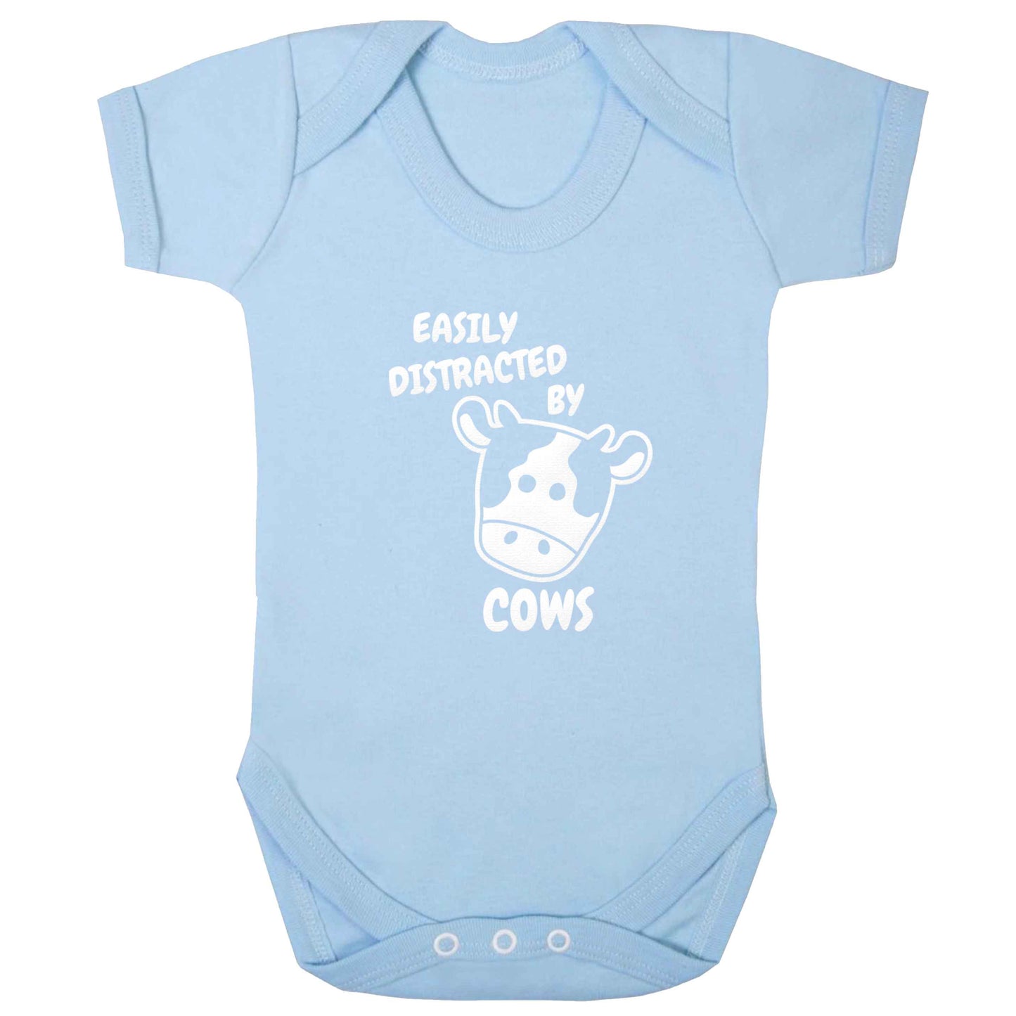 Easily distracted by cows baby bodysuit pale blue 18-24 months