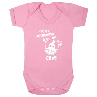 Easily distracted by cows baby bodysuit pale pink 18-24 months