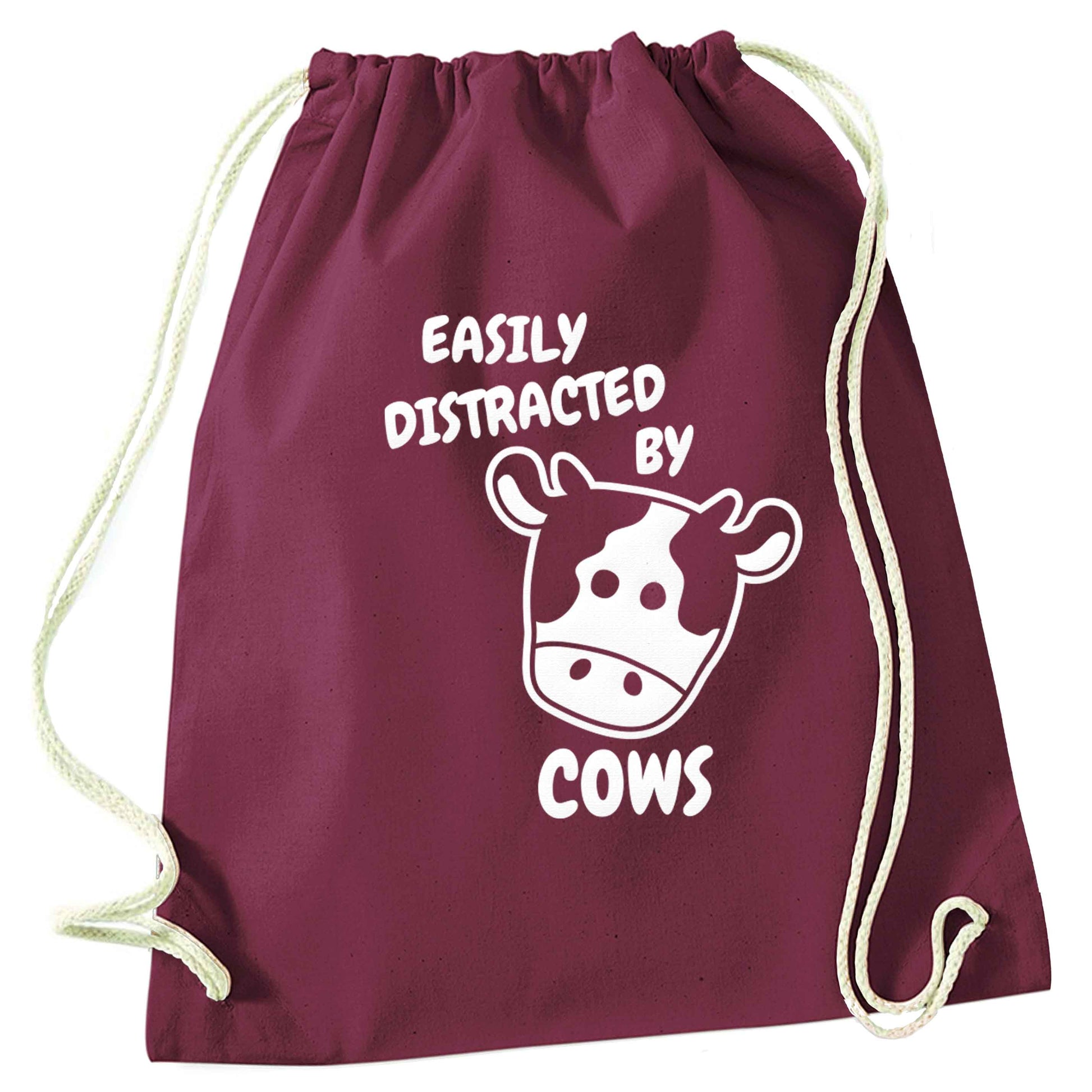 Easily distracted by cows maroon drawstring bag