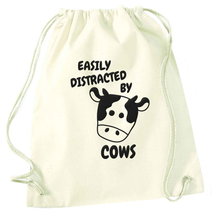 Easily distracted by cows natural drawstring bag