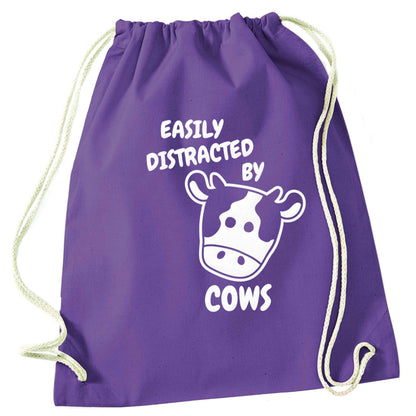 Easily distracted by cows purple drawstring bag