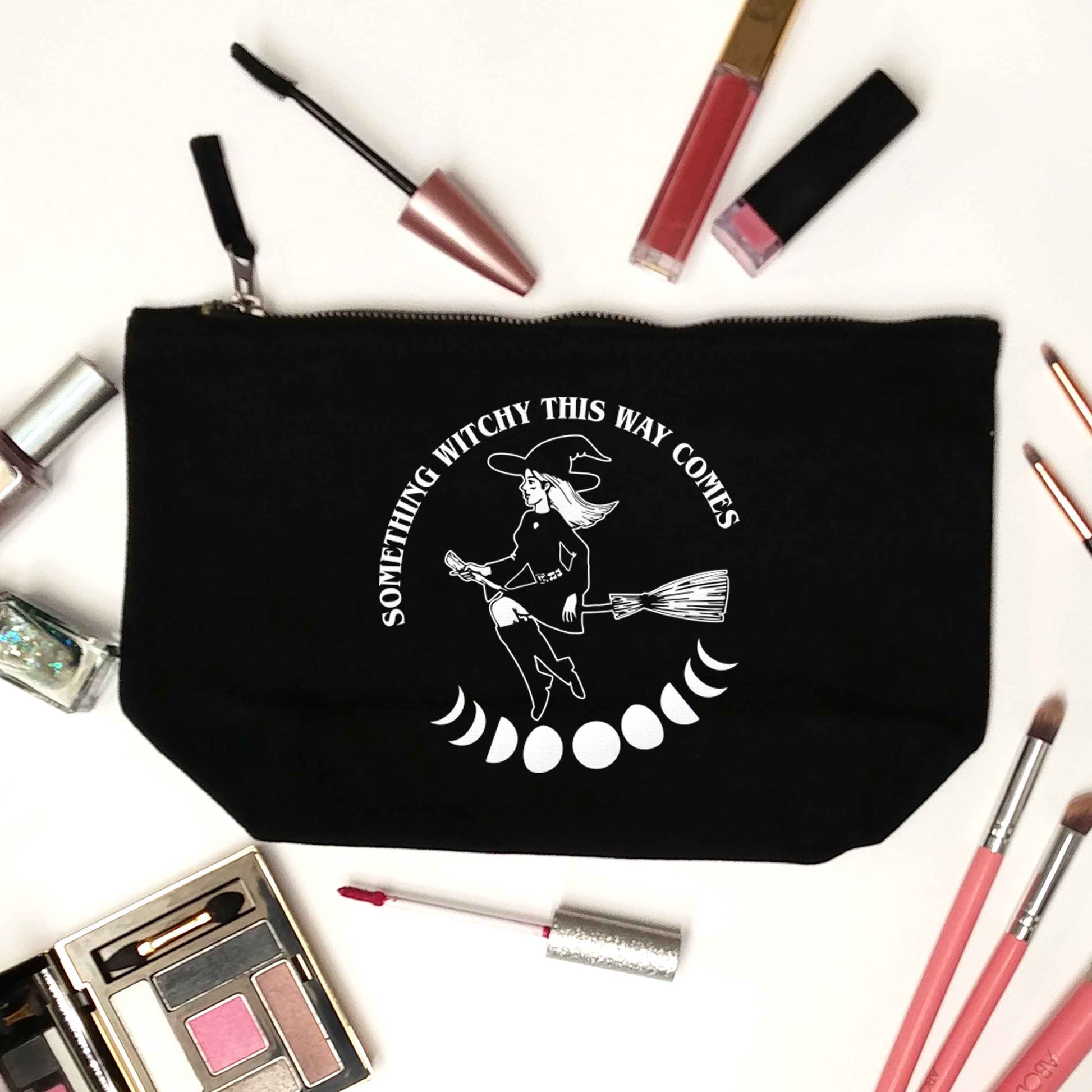 Feeling witchy? This design should hit the spot! black makeup bag