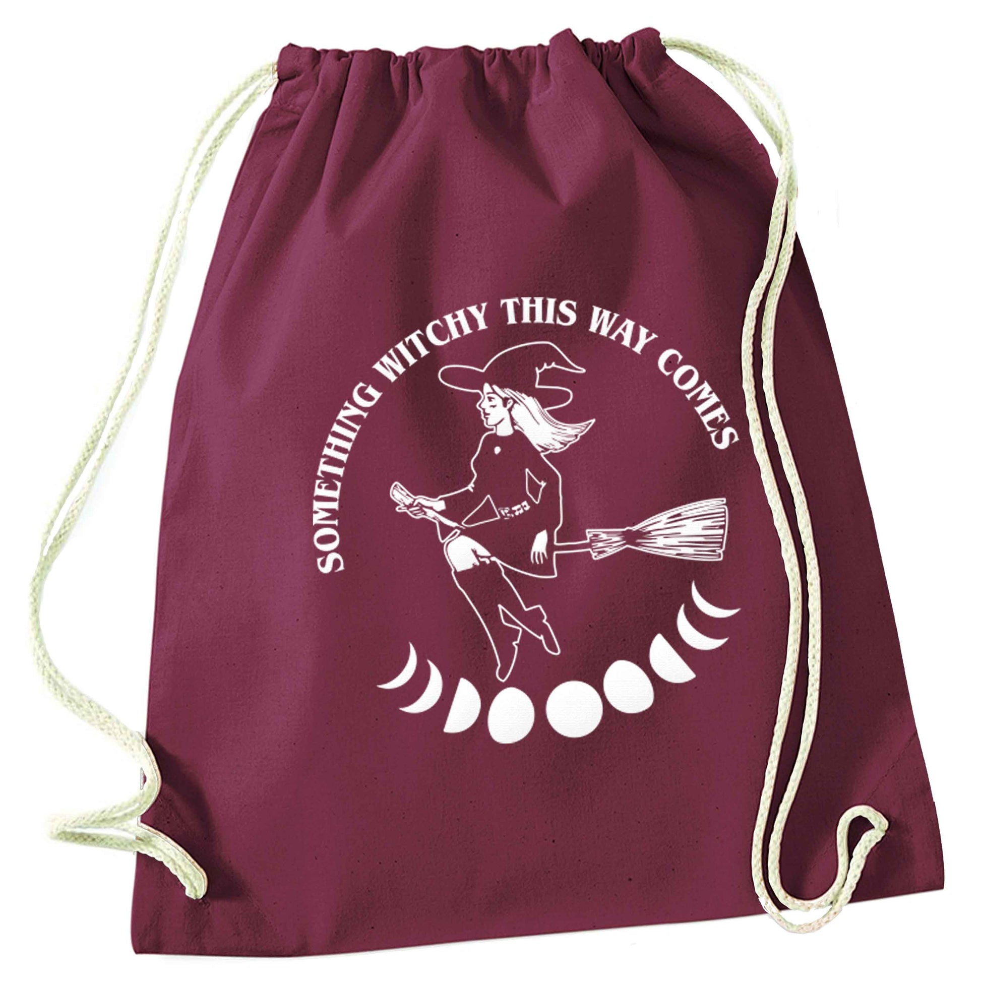 Feeling witchy? This design should hit the spot! maroon drawstring bag