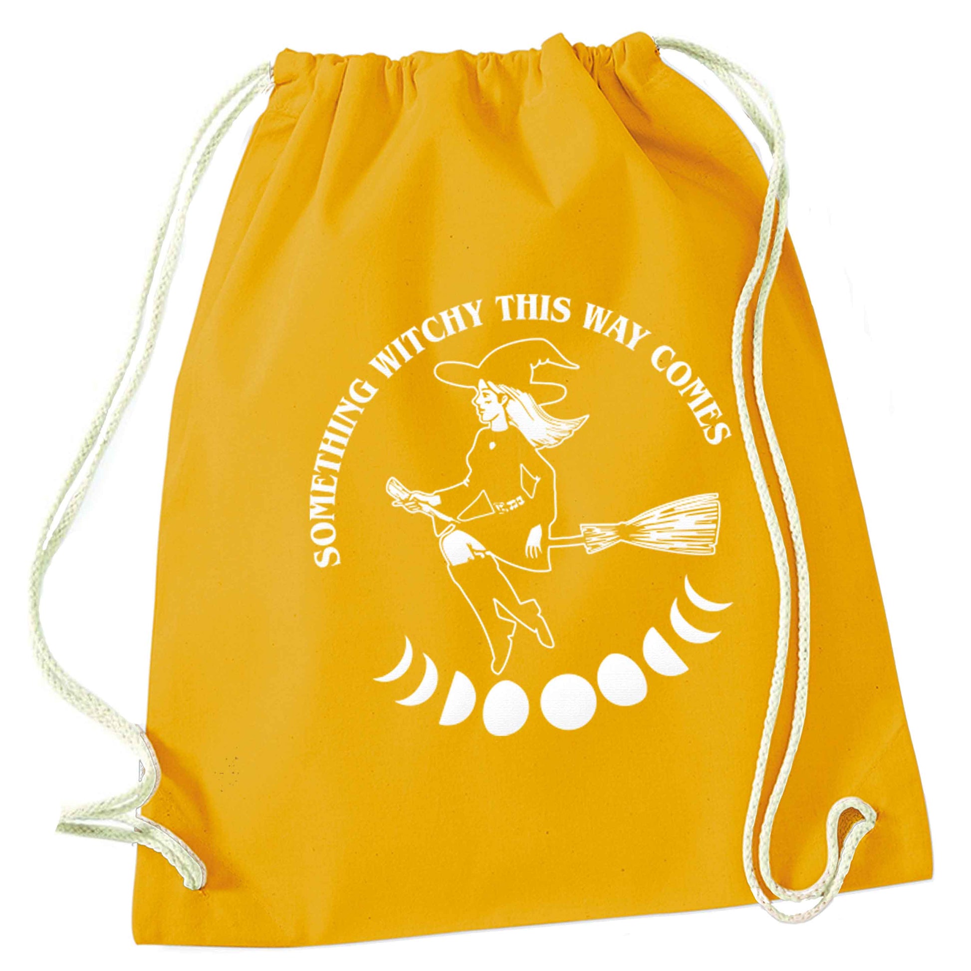 Feeling witchy? This design should hit the spot! mustard drawstring bag