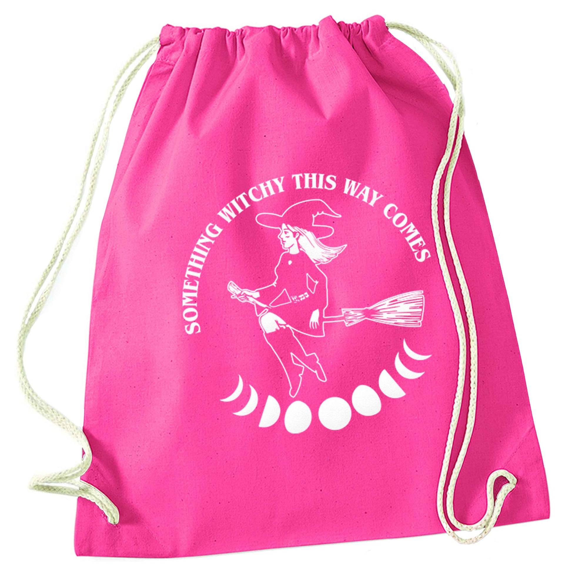 Feeling witchy? This design should hit the spot! pink drawstring bag