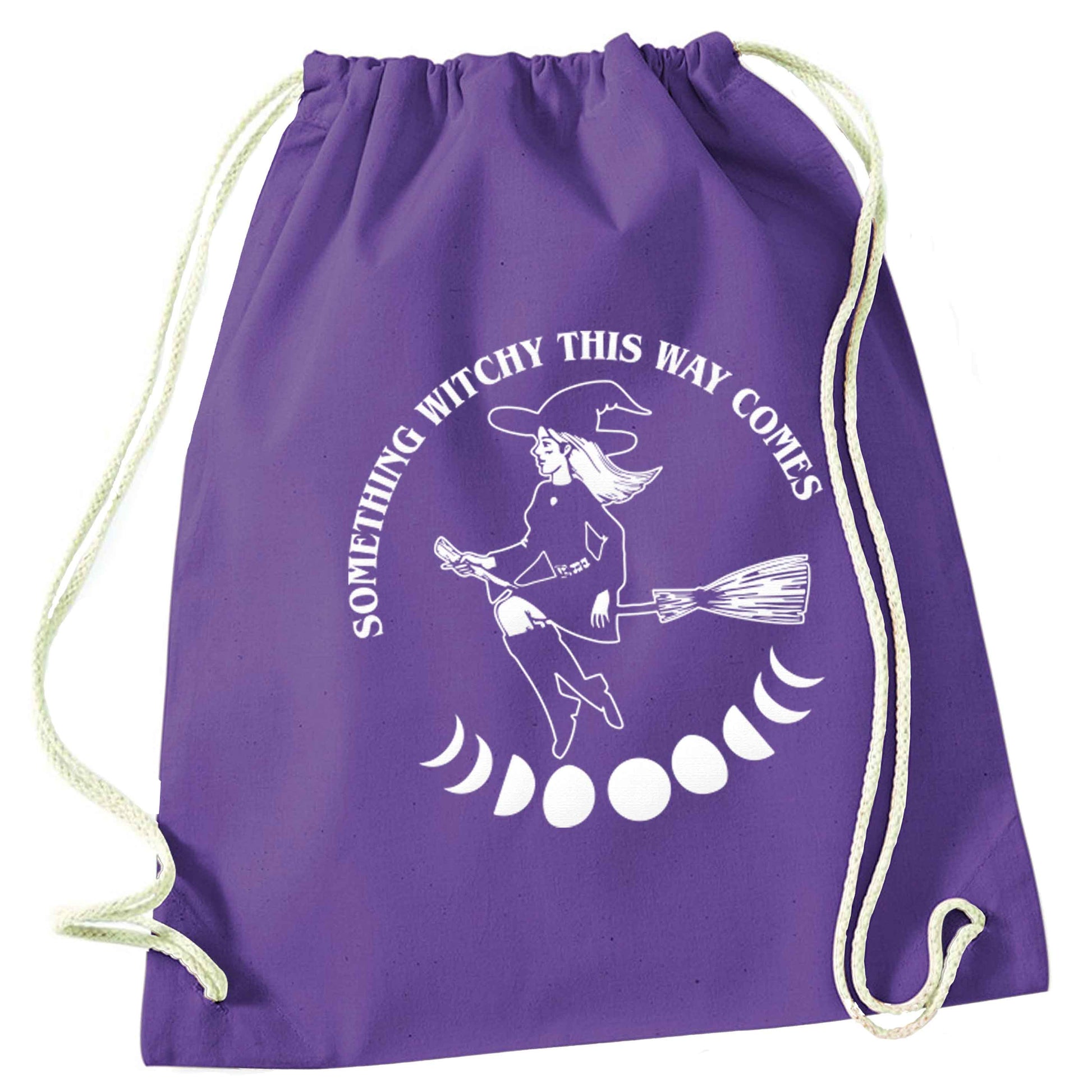 Feeling witchy? This design should hit the spot! purple drawstring bag