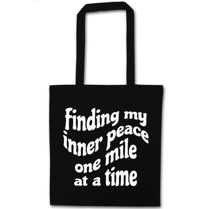 Finding my inner peace one mile at a time black tote bag