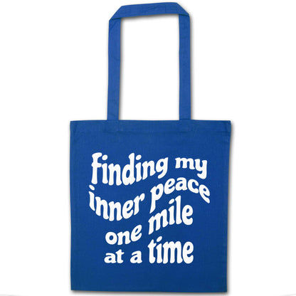 Finding my inner peace one mile at a time blue tote bag
