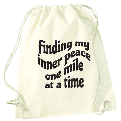 Finding my inner peace one mile at a time natural drawstring bag