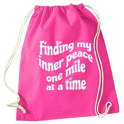 Finding my inner peace one mile at a time pink drawstring bag