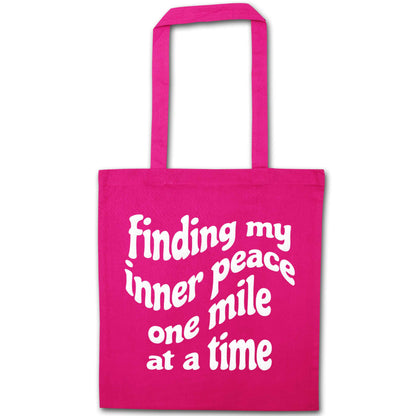 Finding my inner peace one mile at a time pink tote bag