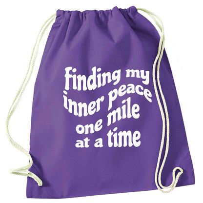 Finding my inner peace one mile at a time purple drawstring bag