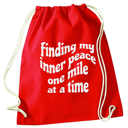 Finding my inner peace one mile at a time red drawstring bag 