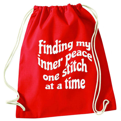 Finding My Inner Peace One Stitch at a Time red drawstring bag 