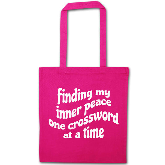 Finding My Inner Peace One Crossword at a Time pink tote bag