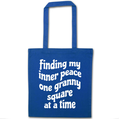 Finding My Inner Peace One Granny Square at a Time blue tote bag