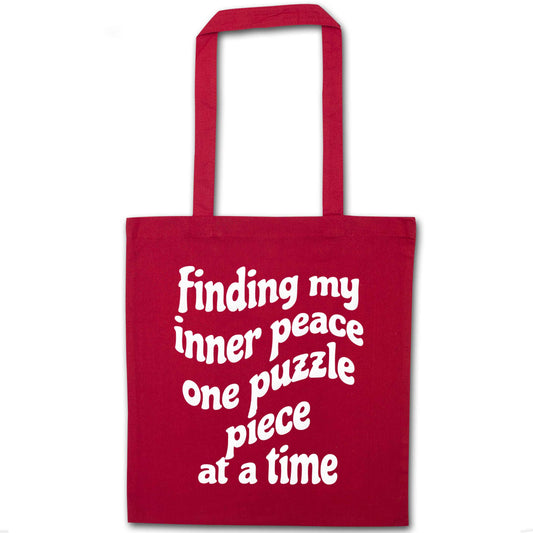 Finding My Inner Peace One Puzzle Piece at a Time red tote bag