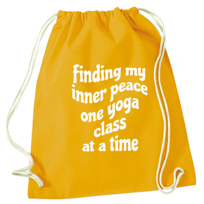 Finding My Inner Peace One Yoga Class at a Time mustard drawstring bag