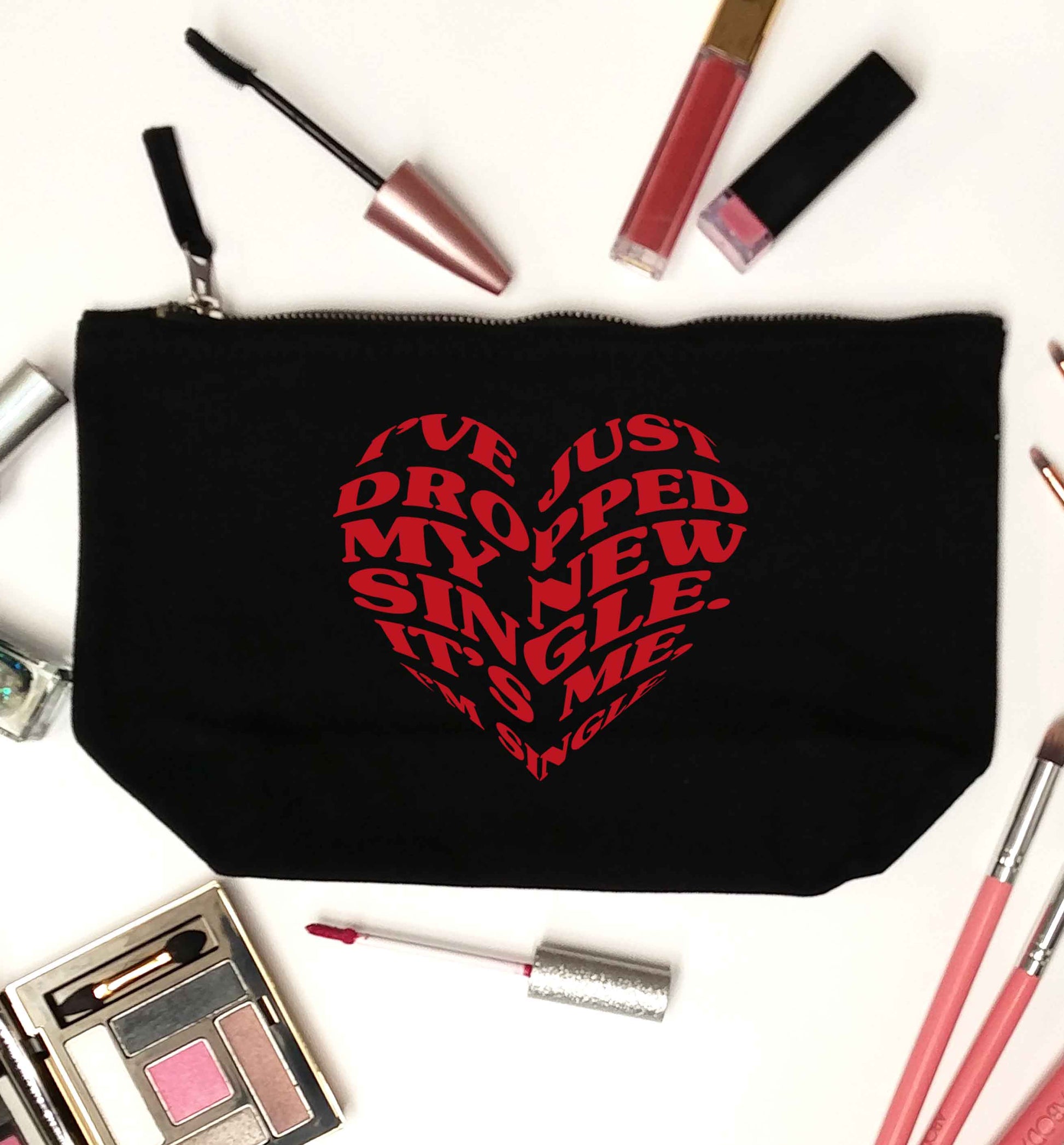 I've just dropped my new single it's me I'm single black makeup bag