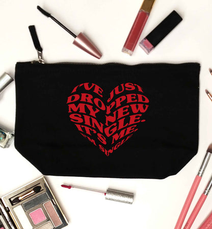 I've just dropped my new single it's me I'm single black makeup bag
