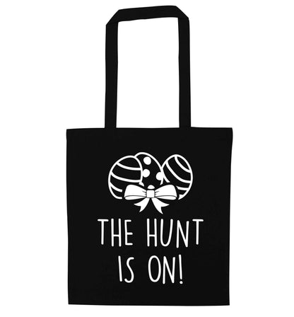 The hunt is on black tote bag