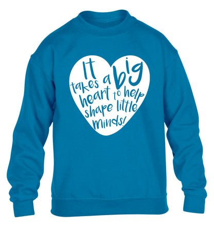 It takes a big heart to help teach little minds children's blue sweater 12-14 Years