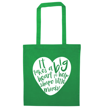It takes a big heart to help teach little minds green tote bag
