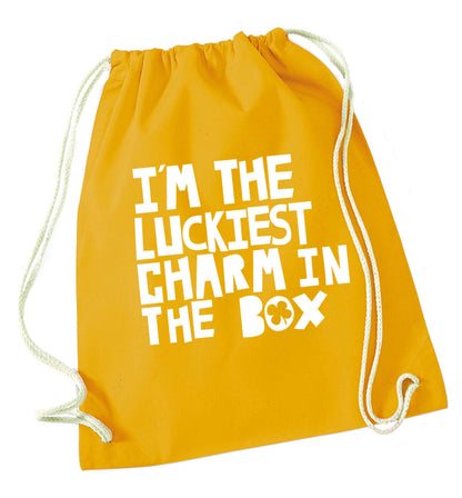I'm the luckiest charm in the box mustard drawstring bag