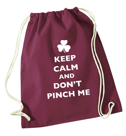 Keep calm and don't pinch me maroon drawstring bag