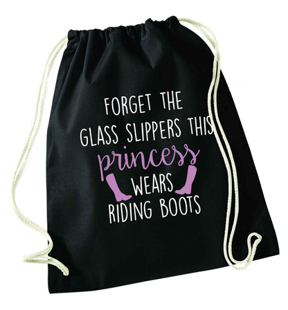Forget the glass slippers this princess wears riding boots black drawstring bag
