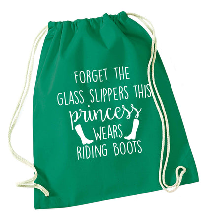 Forget the glass slippers this princess wears riding boots green drawstring bag