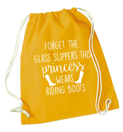 Forget the glass slippers this princess wears riding boots mustard drawstring bag
