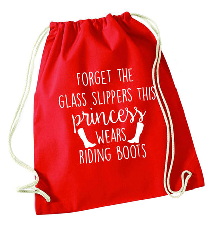 Forget the glass slippers this princess wears riding boots red drawstring bag 
